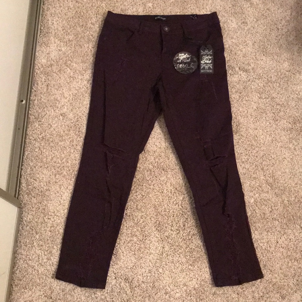 Distressed ankle jeans